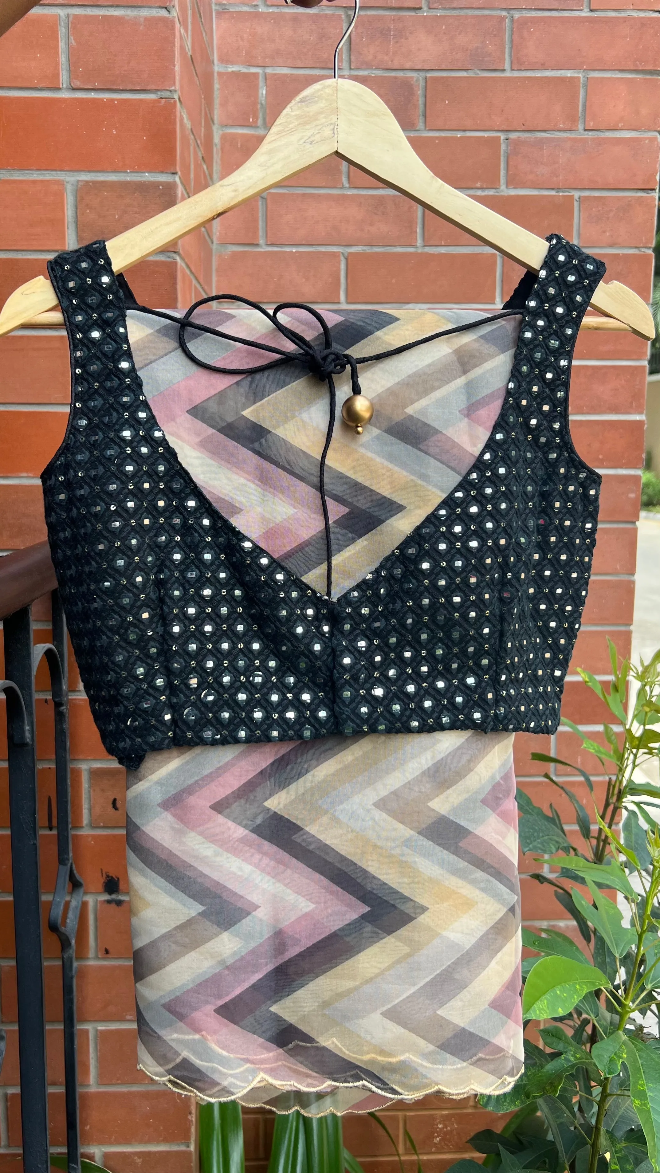 Multi organza saree with black mirror worked blouse